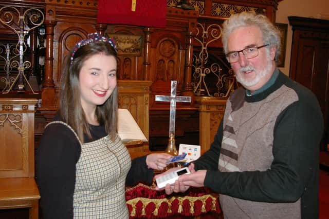 Chorley United Reformed Church now accepts credit and debit cards for its service offerings. Pictured is Rev Martin Whiffen and Jenny Deering (Image: submit)