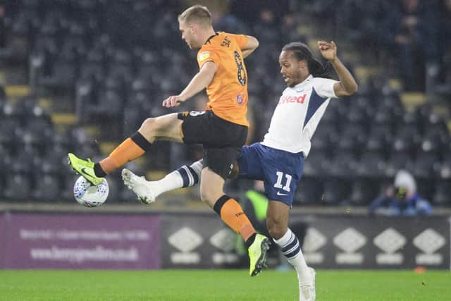Preston midfielder Daniel Johnson challenges Hull's Daniel Batty