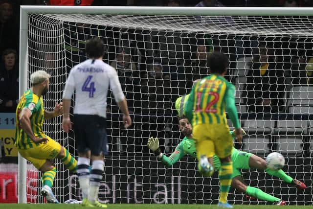 Charlie Austin scores West Brom's late penalty against Preston at Deepdale