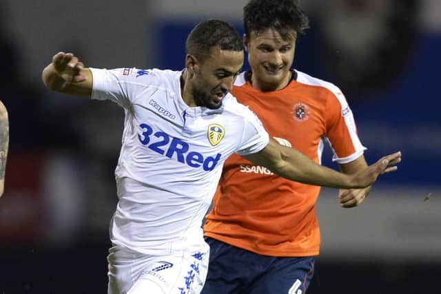 Jonathan Smith in action for Luton battling with Leeds United's Kemar Roofe in August 2016