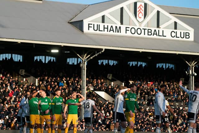 Preston players shelter their eyes from the sun in the game against Fulham at Craven Cottage
