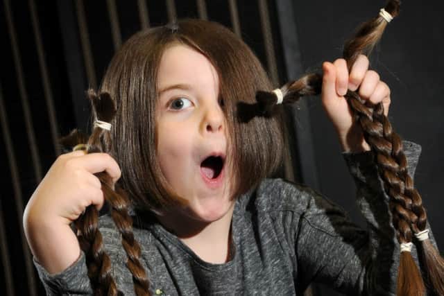 A cut above: Seven-year-old Eve Reid, from Eccleston, had her hair cut for charity.