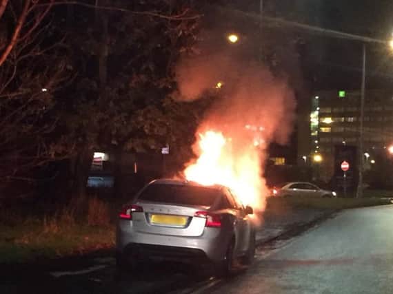 The car caught on fire at the side of the road, a picture uploaded to Twitter by police seemed to show (Picture: Lancashire's Road Policing Unit/Twitter)