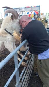 Damian Stanley pictured with his beloved goat Actin who recently passed away. 