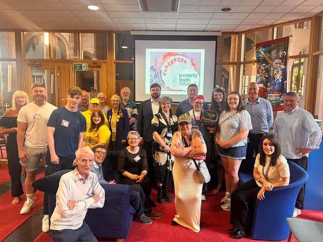 Poverty Truth Network event. Chris Webb in the centre, Gillian Oliver seated on sofa, left