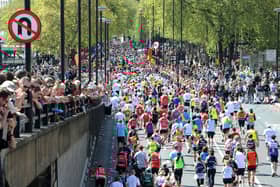 Spectators line the streets at Blackfriars to watch Marathon runners