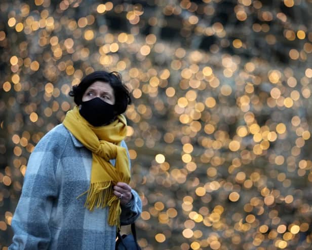 Failure to cover your face could see you hit with a £200 fine (image: Getty Images)