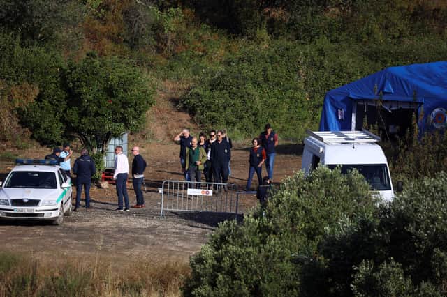 Portuguese Judicial Police criminal investigation unit members prepare at the base camp near the Arade dam, in Silves, on 24 May, 2023 on the second day of a new search operation amid the investigation into the disappearance of Madeleine McCann. 