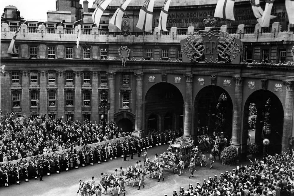 Queen Elizabeth II Coronation carriage and procession coming through Admiralty Arch on the way from Westminster Abbey to Buckingham Palace