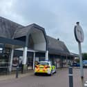 There was a huge police presence outside Booths, in Fulwood, when a man climbed onto the roof this evening
