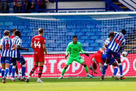 Preston North End’s Liam Lindsay scores