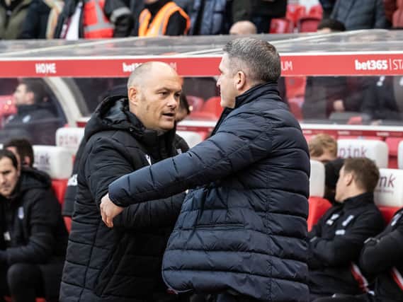 Preston North End's manager Ryan Lowe is greeted by Stoke City's manager Alex Neil