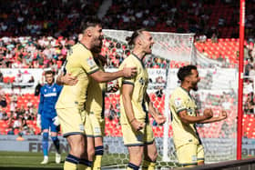 Preston North End's Will Keane (centre) celebrates scoring