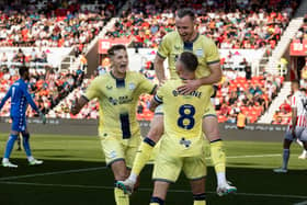 Preston North End’s Will Keane (top) celebrates 