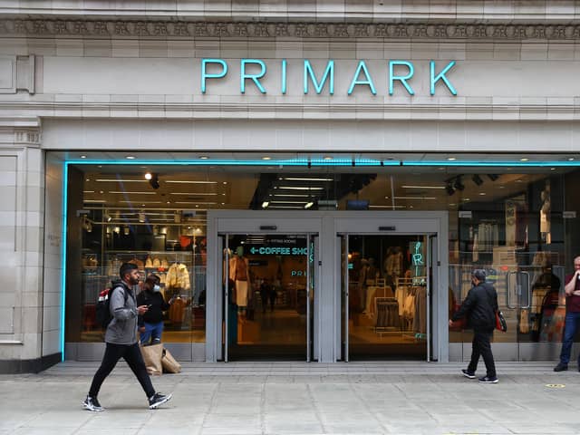 A pedestrian walks past a Primark store on Oxford Street, London.