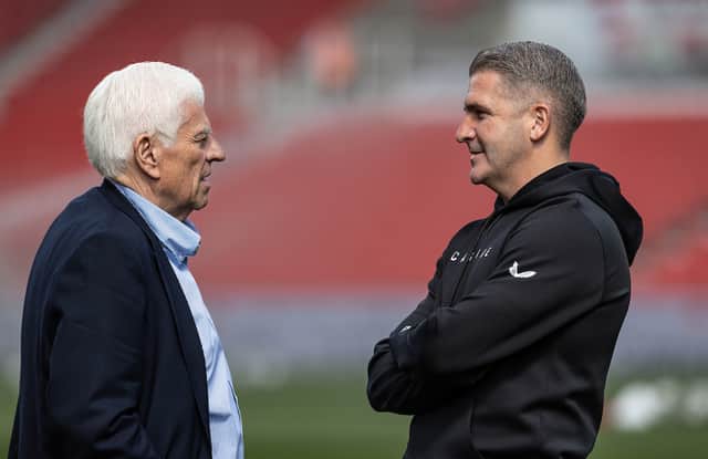 Preston North End director  Peter Ridsdale chats to manager Ryan Lowe
