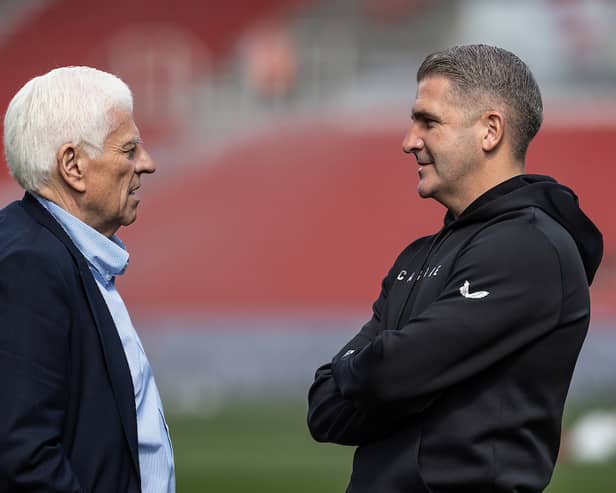 Preston North End director  Peter Ridsdale (left) chats to manager Ryan Lowe before the match 