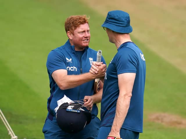 Andrew Flintoff speaks to England's Jonny Bairstow during the nets session at the Kia Oval, London