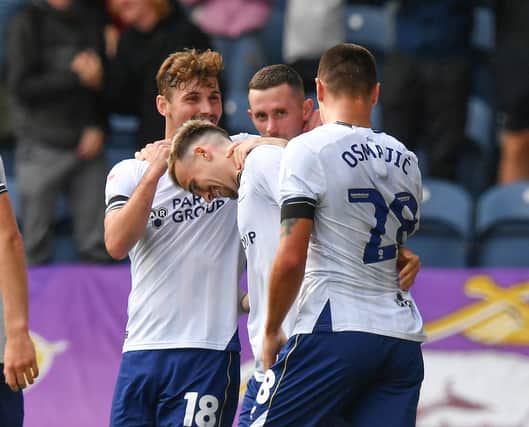 Preston North End’s Liam Millar is congratulated on scoring 