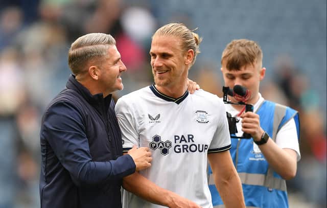 Preston North End's Manager Ryan Lowe and Brad Potts