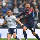 Preston North End's Alan Browne battles with West Bromwich Albion's John Swift