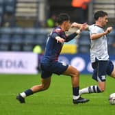 Preston North End's Robbie Brady battles with West Bromwich Albion's Jeremy Sarmiento
