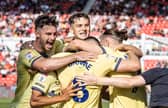 Preston North End's Will Keane (right) celebrates scoring his side's second goal 