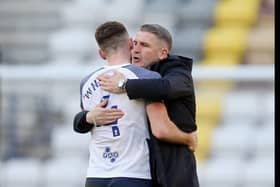 Preston North End manager Ryan Lowe embraces Ben Whiteman at the final whistle