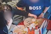 A pub customer has been caught on CCTV placing their own hair into their food in an attempt to get a refund for their meal. (Credit: Tom Croft / SWNS)