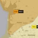 Yellow and amber weather warnings have been issued by the Met Office as Storm Debi hits Lancashire.