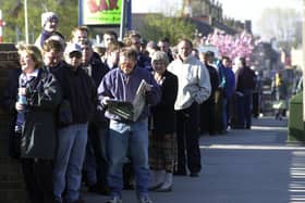 Fans wait on Sir Tom Finney Way at Deepdale to get their tickets for the Birmingham v Preston North End Championship play-off match in 2001