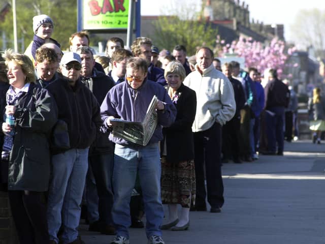 Fans wait on Sir Tom Finney Way at Deepdale to get their tickets for the Birmingham v Preston North End Championship play-off match in 2001