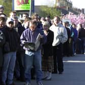 Fans wait on Sir Tom Finney Way at Deepdale to get their tickets for the Birmingham v Preston North End Championship play-off match in 2001