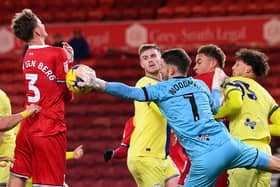 Middlesbrough player Rav van den Berg diverts the ball to score 