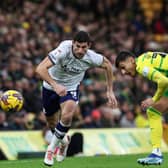 Preston North End's Ched Evans battles for possession with Norwich City's Dimitris Giannoulis