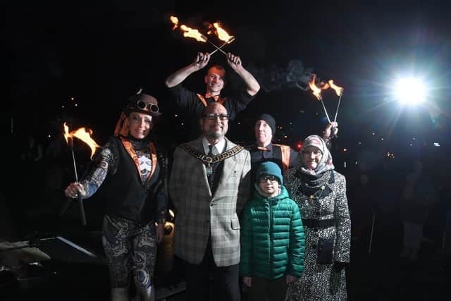 The Mayor of Preston, Councillor Yakub Patel, enjoying the fire garden with his family