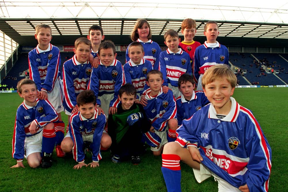 Winners of the Lancashire Evening Post\Preston North End\McDonalds design a kit competition, St Annes RC Primary School, Leyland, celebrate by showing off their winning design before the PNE v Oldham game. 
The kit was designed by pupil Ben Ward, pictured with his class mates