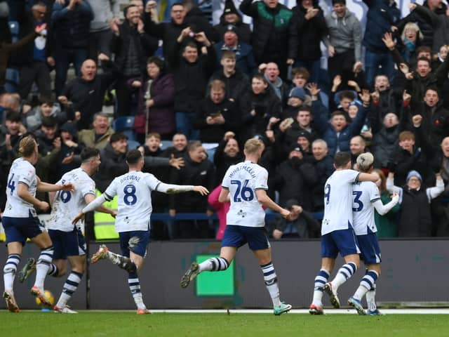 Preston North End players celebrate with their supporters. The Lilywhites boast a respectable away following. (Image: Getty Images)