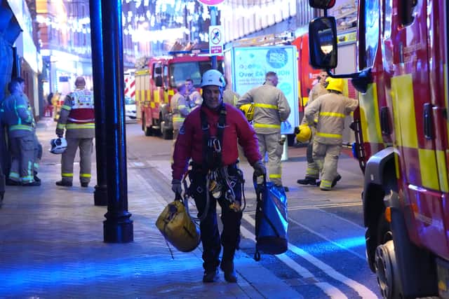 Firefighters at the scene after they were called to a blaze at Blackpool Tower which was actually "orange netting"