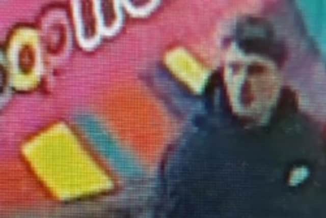Do you recognise this man? Officers would like to speak to him in connection with an assault in Preston (Credit: Lancashire Police)