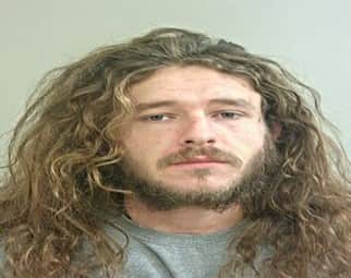 Liam O'Connor is wanted for criminal damage, malicious communications and making threats to damage property (Credit: Lancashire Police)