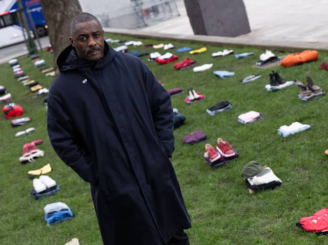 Idris Elba stands in front of an installation of over 200 bundles of clothing representing the lives lost to Knife crime in the UK as he calls on the Government to take immediate action to prevent serious youth violence at Parliament Square on January 08, 2024. (Photo by Jeff Spicer/Getty Images for Don't Stop Your Future)