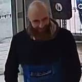 Lancashire Police want to speak to the man pictured in relation to an assault and a sexual touching offence against a woman in her 30s on the 6A bus travelling towards Blackburn from Accrington at around 12.35pm on November 13