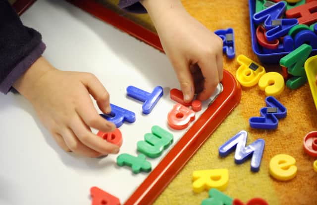 New estimates suggest parents in Lancashire were paying £5.41 an hour in 2023 to have their two-year-olds looked after (Credit: PA)