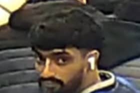 Do you recognise this man? Officers want to speak to him following a hate crime onboard a train in Lancashire (Credit: British Transport Police)