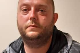 Lee Wilkinson is wanted for making threats to kill and on recall to prison (Credit: Lancashire Police)