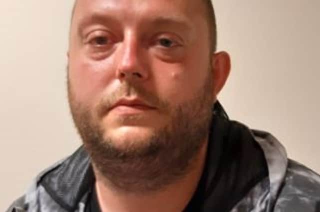 Lee Wilkinson is wanted for making threats to kill and on recall to prison (Credit: Lancashire Police)