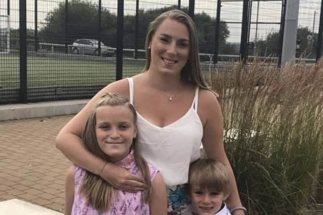 Fiona Robinson with her children (Credit: Lancashire Police)