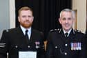 Chief Constable Chris Rowley and PS Timperley being presented with his award (Credit: Lancashire Police)