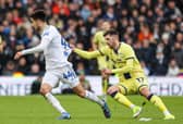 Preston North End's Layton Stewart battles with Leeds United's Ilia Gruev